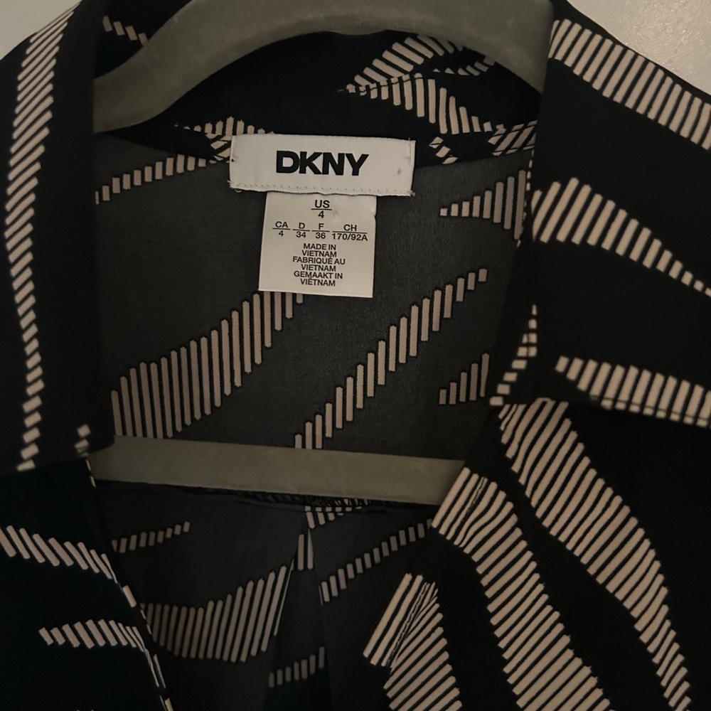 Donna Karan New York wrap dress. New with tags. Size  is 4 but fits like a 6.